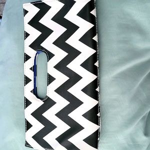 Chevron striped clutch with blue liner